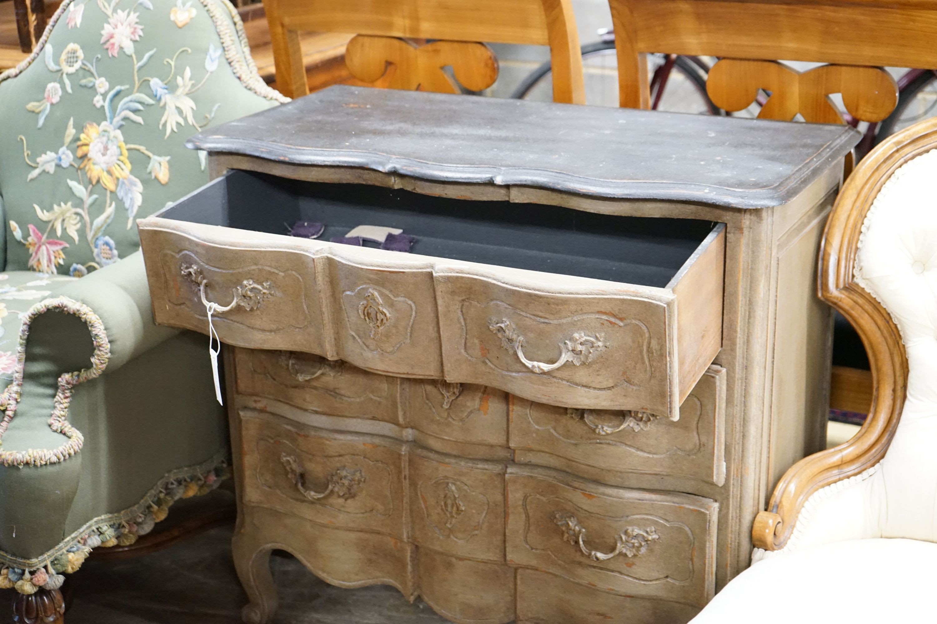 A Louis XV style painted serpentine commode, length 90cm, depth 43cm, height 84cm
